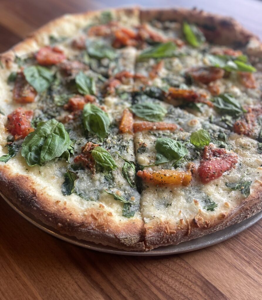 Pi Vegan "Sweet Italian Tom Tom" pizza for Vegan Dining Month