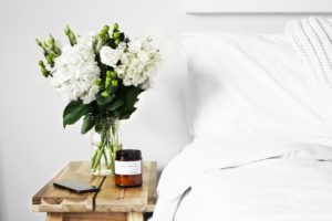 wellness sanctuary: a cozy bed and flowers